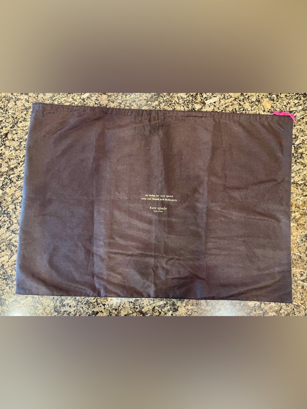 kate spade brown fabric dust pouch with gold logo